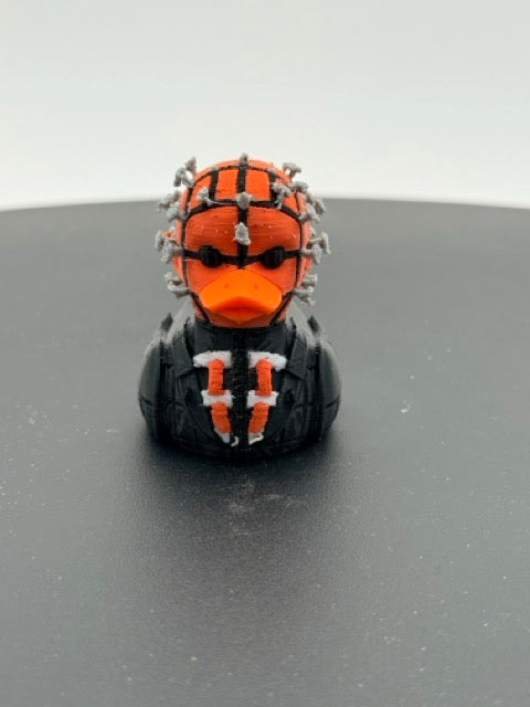Grid-Head Horror Priest Duck